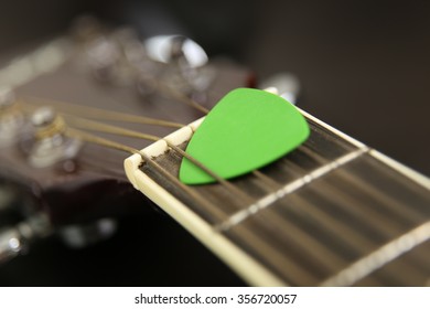 Plectrum And Guitar