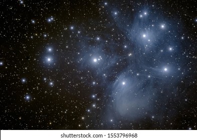 The Pleiades also known as the Seven Sisters and Messier 45, are an open star cluster