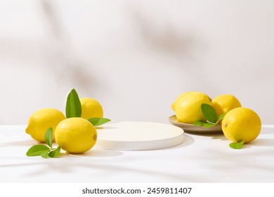 Plenty yellow lemons featured on table over white background with an empty podium in center for displaying beverage, culinary or skincare product, which made from lemon. Front view, blank space - Powered by Shutterstock