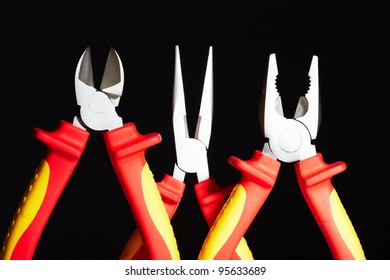 Pliers On Black Background. Tools Of Electrician.