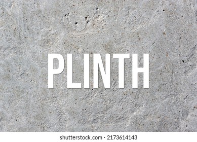 PLINTH - Word On Concrete Background. Cement Floor, Wall.