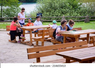 PLITVICE LAKE NATIONAL PARK, CROATIA - AUG 19, 2014: Restaurant in the Plitvice Lakes National Park, which is a UNESCO World Heritage site - Shutterstock ID 214655413