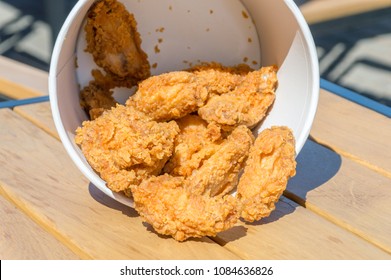 Plonsk, Poland - April 20, 2018: KFC Chicken Hot Wings In Bucket.