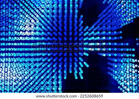 Plot of an abstract map of the world made up of blue led lights on a dark background. European Parliament building, Brussels, Belgium