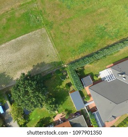 Plots With A Meadow, A Lawn, A Detached House And A Terraced House Adjoin At One Point, Plot Boundaries Look Like An Abstract Cross, Germany