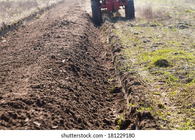 ploughing in the fields
