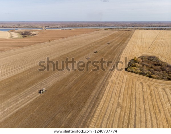 plowed agricultural crop field on which there were\
traces of the transported vehicles during the processing of the\
field