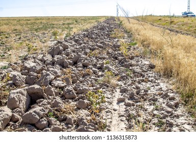 Plowed Anti-piercing Strip Between Field And Road