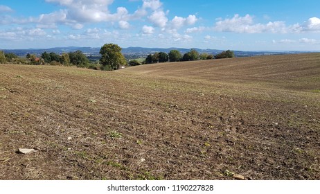 Plowed Field And Blue Sky