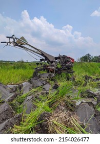 The Plowing Machine Is In Rice Field That Has Been Plowed.