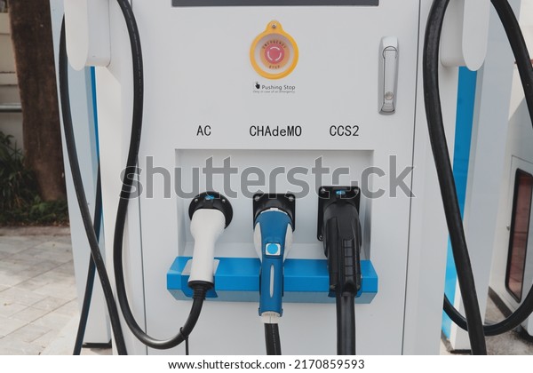 Plug EV
charging station for electric car charging battery. Electric car
power station with electricity charging
battery