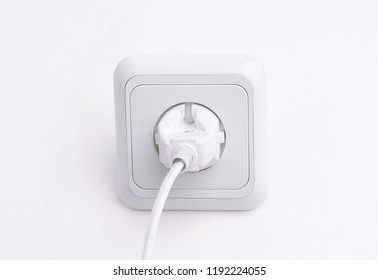 Plug Into An Electrical Outlet.isolated On A White Background.