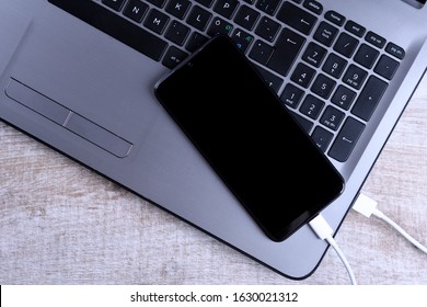 6,558 Laptop Phone Charging Images, Stock Photos & Vectors 