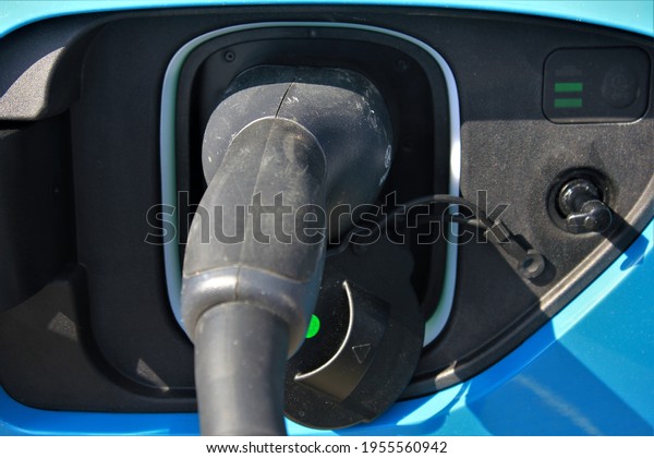 Plugged in electric Vehicle\
charger