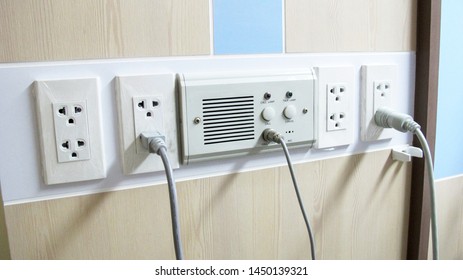 Plugged into the Electrical Wall Socket and intercom for nurse calls and light switches on the wall In the thai hospital's patient room to accommodate medical devices