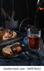 plum cake and flavored tea. Atmospheric cozy breakfast or snack - Shutterstock ID 569974612