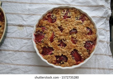 Plum Crumble Straight From The Oven On A Tea Towel