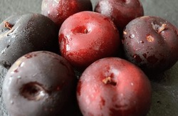 A Plum Is A Fruit Of Some Species In Prunus Sung. Prunus. Flesh Is Firm And Juicy. The Fruit 's Peel Is Smooth, With A Natural Waxy Surface That Adheres To The Flesh. The Plum Is A Drupe. India.