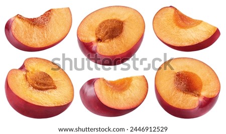 Plum isolated set. Collection of halves and slices of red plums on a white background.