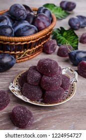 Plum Jelly Candies In Sugar On Wooden Background. Selective Focus.