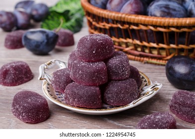 Plum Jelly Candies In Sugar On Wooden Background. Selective Focus.