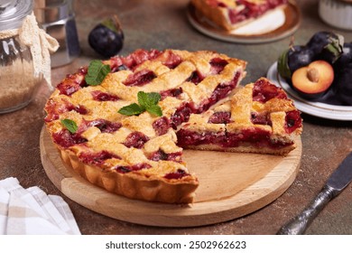 Plum pie with lattice. Delicious summer homemade American cake with plums and cinnamon. Sweet dessert  - Powered by Shutterstock