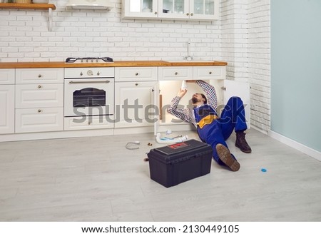 Similar – Mother hugging her baby in front of fireplace