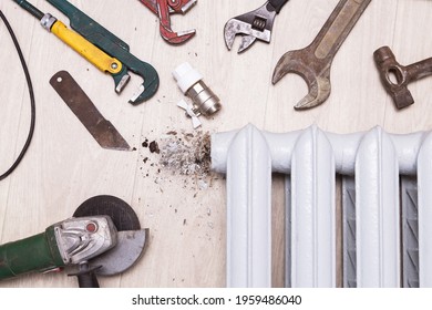 Plumber Different Tools, Angle Grinder And Equipment For Repair Valve Of Broken Radiator Central Heating And Pipes At Home