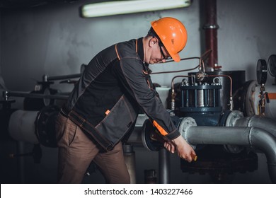 a plumber engineer repairing pipes at work