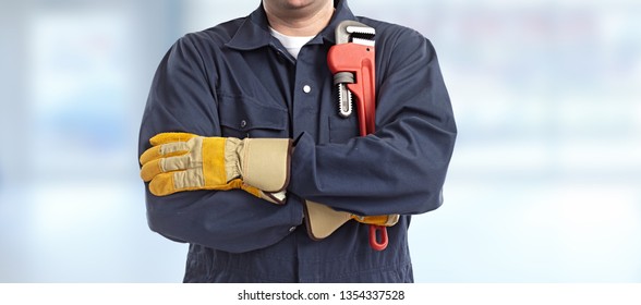 Plumber Hand With Wrench.