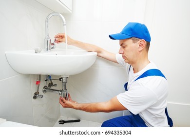 Plumber Man Repair Leaky Faucet Tap