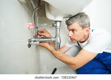 Plumber Man Repair Leaky Faucet Tap