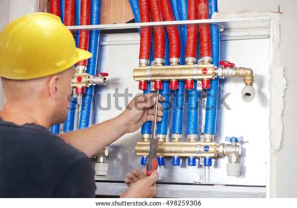 Plumber mounted distributor of central\
heating. Central Heating\
Distributor