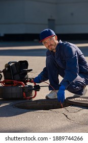 Plumber Prepares To Fix The Problem In The Sewer With Portable Camera For Pipe Inspection And Other Plumbing Work.