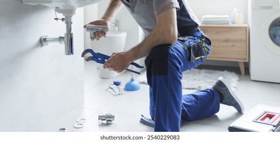 Plumber replacing sink pipes at home, professional service concept