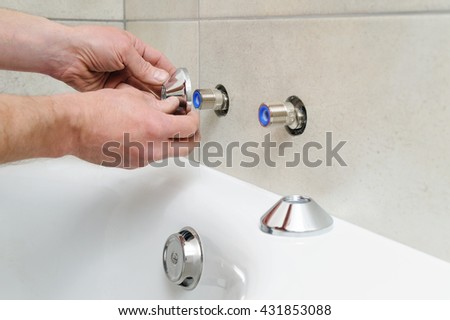 Plumber sets escutcheon of the bath faucet.