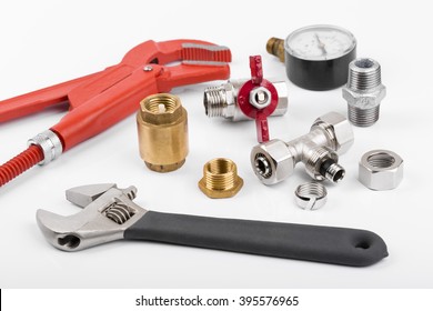 Plumber Tools And Accessories On White Background