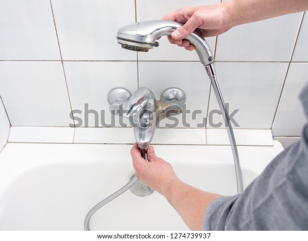 Plumber Uninstalling Shower Hose Bathtub Faucet Stock Photo Edit