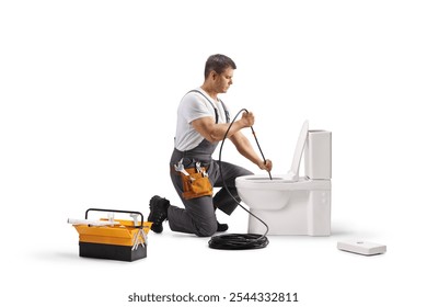Plumber using a drain snake for a clogged toilet isolated on white background
