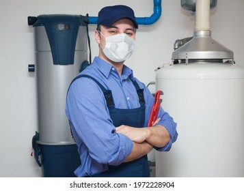 Plumber Wearing A Mask At Work, Covid Concept