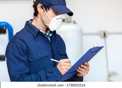 Plumber At Work Wearing A Mask, Coronavirus Concept