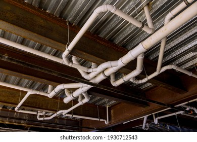 Plumbing Rough-in In Commercial Building With Pvc Pipe In Construction Site Of Apartment