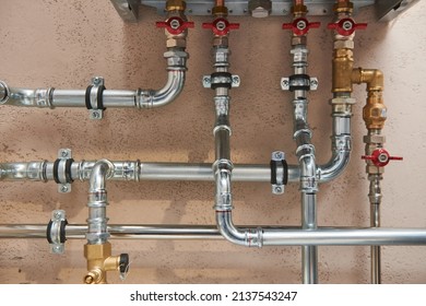Plumbing service. steel of a heating system in boiler room - Shutterstock ID 2137543247