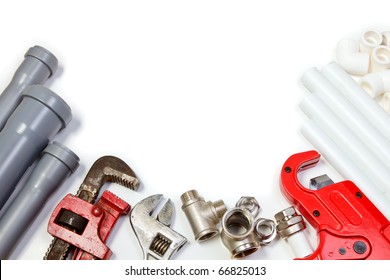 Plumbing tool pipes and fittings on white background