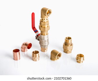 Plumbing valves, ball valves, fasteners and fittings on the white background - Shutterstock ID 2102701360