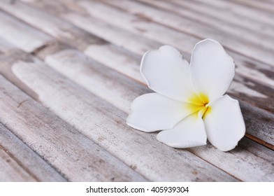 Plumeria On Bamboo Table 