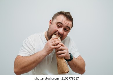 Plump Funny Man Eating Tasty Shawarma. Glutton