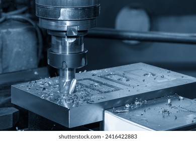 The plunge cutting  process on NC milling machine with flat end mill tools. The metal working concept on the milling machine.