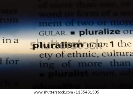 pluralism word in a dictionary. pluralism concept.