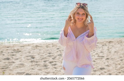 Plus size American blonde woman at nature, enjoy the life, walk at beach. Life of people xl size, happy nice natural beauty woman